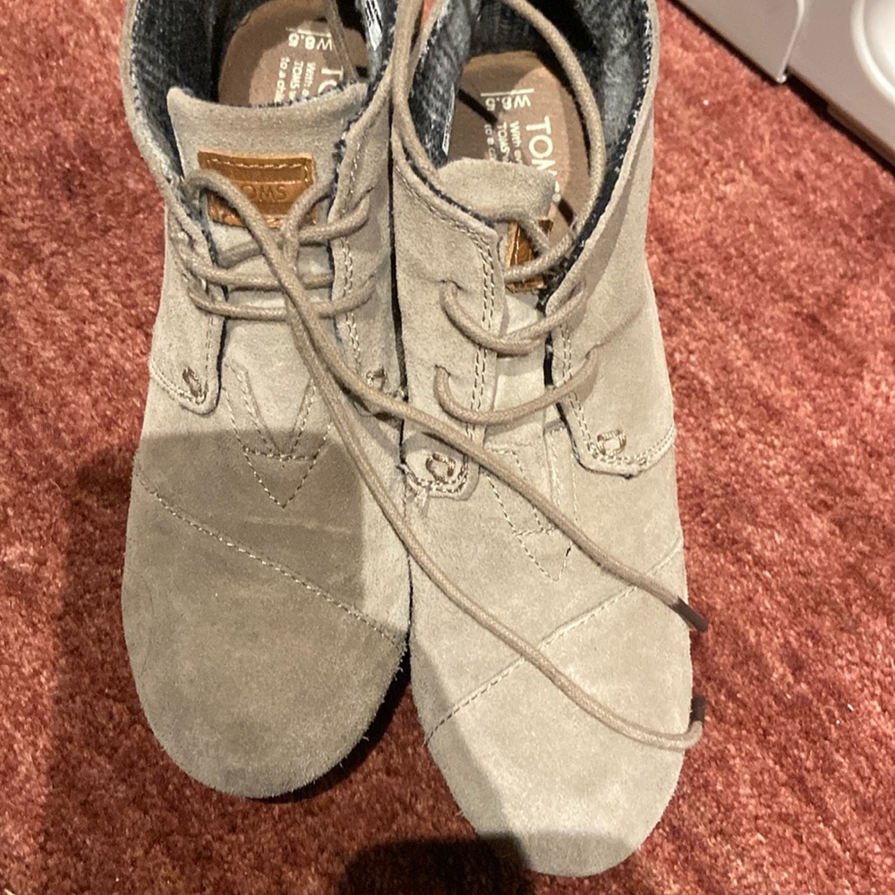 Tom’s wedge booties